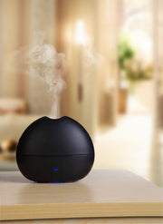 Ultransmit ipple diffuser front view with ambient LED glow for mood lighting.