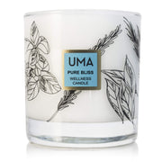 UMA Pure Bliss candle jar glow with chamomile and lavender for relaxation and meditation ambiance.