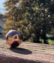 Unique Metals Pure Copper Sphere side view, compact grounding decor for modern altars.