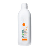 Univera km bottle being poured for convenient daily potassium support