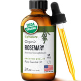 UpNature Rosemary Oil bottle pouring, highlighting purity for hair care