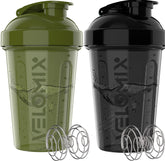 Velomix 20oz protein shaker green and black, ideal for mixing shakes on the go.