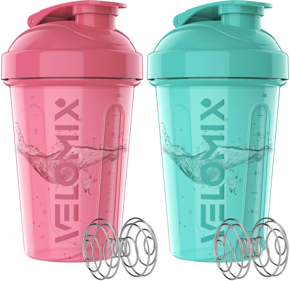 VELOMIX pink 20oz shaker bottle with wire whisk for smooth protein blends.