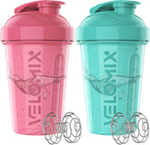VELOMIX pink 20oz shaker bottle with wire whisk for smooth protein blends.