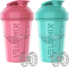 VELOMIX pink 20oz shaker bottle with wire whisk for smooth protein blends.