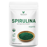 VELOTO Spirulina powder bottle pour for daily nutrient boost.