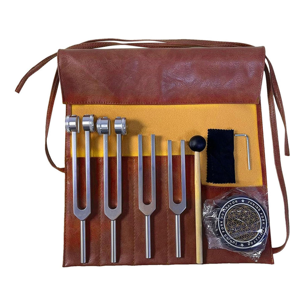 Verveens tuning forks healing set displayed with activator and leather pouch for meditative practice.