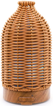 Victoria Aroma rattan diffuser on a shelf with compact design ideal for desks.