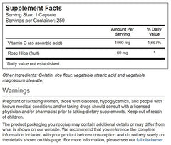 Close-up of Vitacost Vitamin C capsules with rose hips, highlighting 1000 mg per serving.