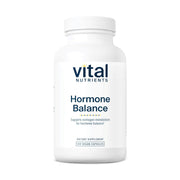 Vital Nutrients Hormone Balance bottle on wood table showing hormone metabolism support
