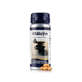 Vitalzym Serrapeptase bottle pouring capsules for fast absorption.