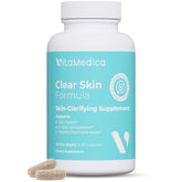 VitaMedica Clear Skin Formula bottle on a vanity promoting a healthier complexion