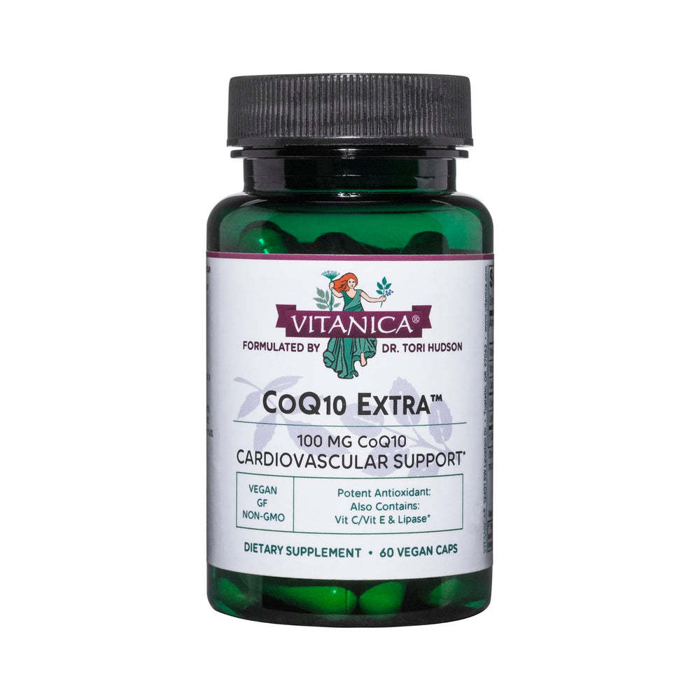 Vitanica CoQ10 Extra bottle on table signaling vegan, non-GMO daily wellness.