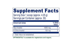 Optinositol scoop beside bottle for easy daily intake