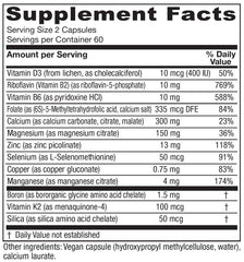Closeup of OsteoBlend capsules emphasizing plant-based bone support.