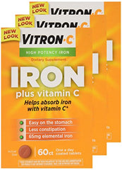 Pouring Vitron-C tablets from the bottle for convenient daily use.