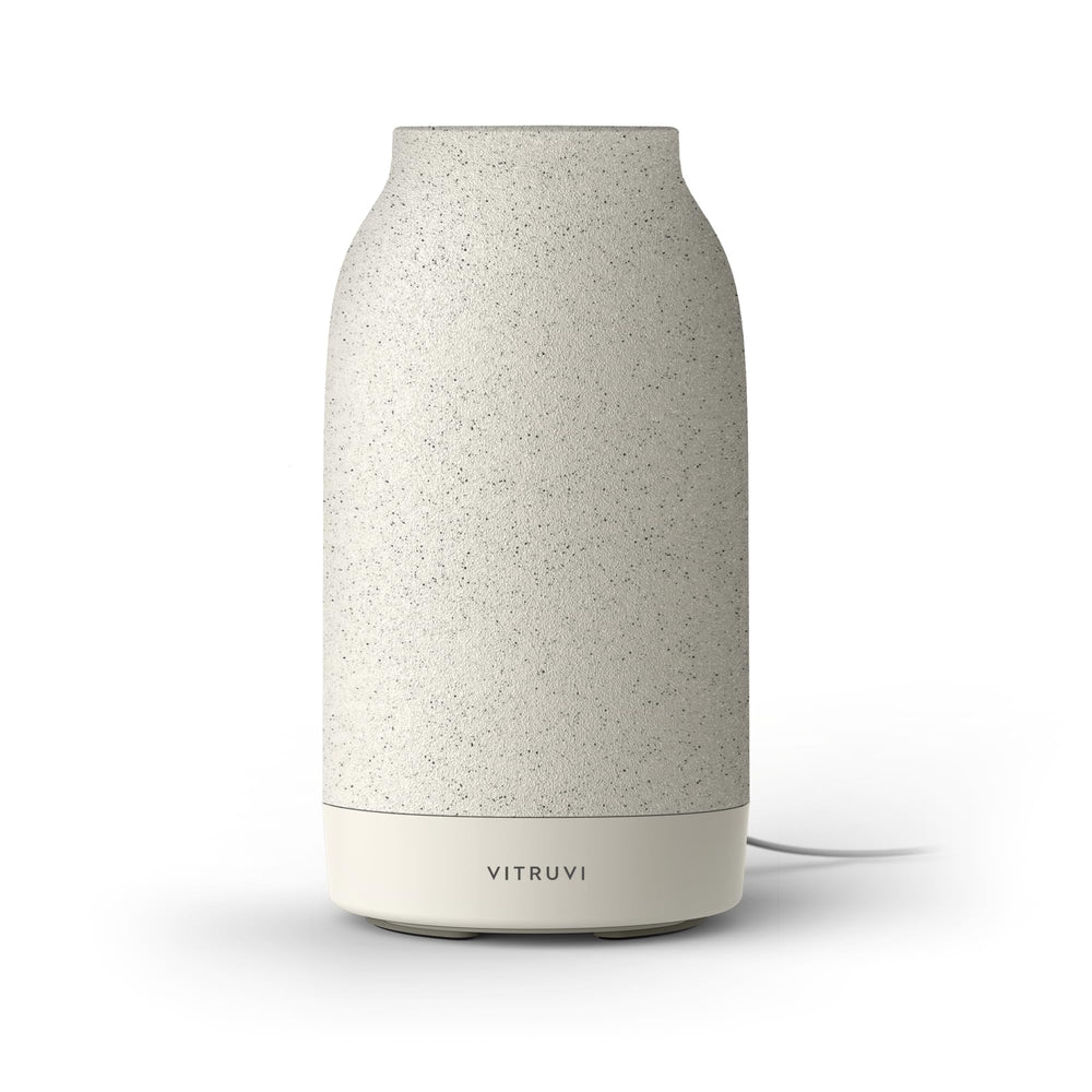 Vitruvi air waterless diffuser showing 1,500 sq ft coverage for large rooms and open spaces