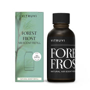 Vitruvi Forest Frost refill bottle close-up showing woodsy Fir, Cedarwood and Pine scent for calm spaces.