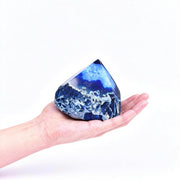 VIZYTOU agate wand irregular column dyed blue on coastal shelf for calm ambiance