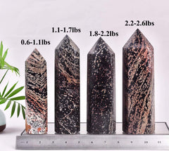 VIZYTOU Gold Snowflake Obsidian tower as a striking home decor piece.