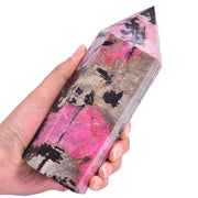 VIZYTOU Rhodonite tower obelisk front view enhances room ambiance and displays natural pattern