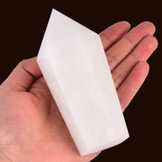 VIZYTOU white crystal obelisk, front view for meditative ambience.