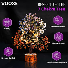 VOOXE handcrafted chakra tree base on wood enhances desk harmony.