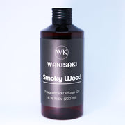 WAKISAKI Smoky Wood diffuser oil bottle for a calming space and lasting scent.
