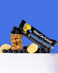 Bar beside a water bottle for post-workout refuel.