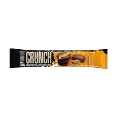 Warrior Crunch Bars caramel layer close-up showing gooey texture and bite.
