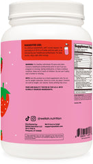 Glass of Wellah whey shake with strawberries and cream, ready for a nutritious boost.
