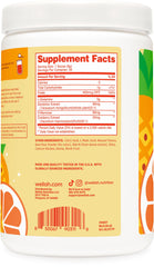 Wellah L-Glutamine Tropical Punch ready-to-mix powder in a glass with shaker.