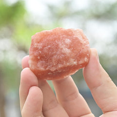 WHAL&YUNE orange salt raw stone, natural facets catch light, perfect as a mantel centerpiece.