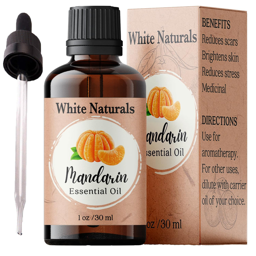 White Naturals Mandarin oil bottle close-up for pure aromatherapy at home.