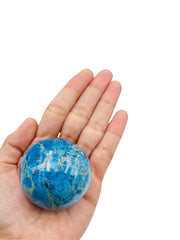 Wholesale Gem Shop Apatite ball sphere side view for balanced energy touch
