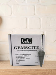 Wholesale Gem Shop blue aventurine pendulum resting on velvet pouch for gifting