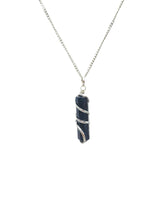 Wholesale Gem Shop crystal point pendant showing natural quartz for versatile everyday style.
