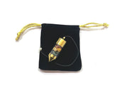 Wholesale Gem Shop brass pendulum closeup showing the brass detail for intuitive dowsing