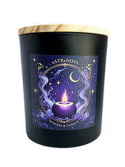 Wick & Whisper Astranova candle in matte black jar glows for evening calm.