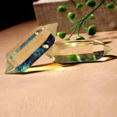 Wixine natural citrine wand on desk or shelf for calming display.