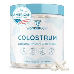 WONDERCOW Colostrum Capsules bottle on kitchen counter suggesting daily gut and immune support.