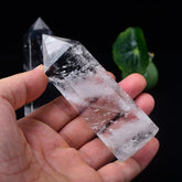 WUYOUSHI clear quartz tower with a polished spire for focused meditation.