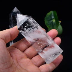 WUYOUSHI clear quartz tower with a polished spire for focused meditation.