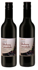 Wyldewood Elderberry concentrate bottle pour, easy to add to daily drinks.