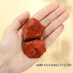 XIANNVXI Red Jasper energy stone, side view showing color patterns and texture