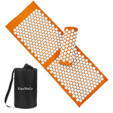 XiaoMaGe orange acupressure mat laid out for relaxation