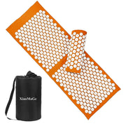 XiaoMaGe orange acupressure mat laid out for relaxation