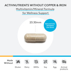 Closeup of XYMOGEN ActivNutrients capsules highlights smooth texture and vegetarian-friendly formulation.