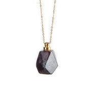 YGLINE Amethyst necklace bottle close-up, showcasing crystal and aroma bottle for personal fragrance.