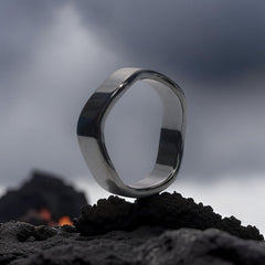 Close-up of YITANA ring with glossy surface for everyday wear.